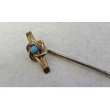 Tested as 9ct gold and turquoise stick pin total weight 1.