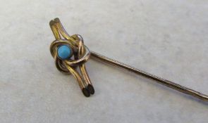 Tested as 9ct gold and turquoise stick pin total weight 1.