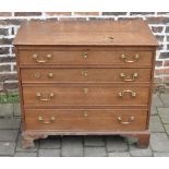 Georgian oak chest of drawers on bracket feet with brass swan neck handles (one detached &