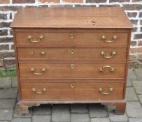 Georgian oak chest of drawers on bracket feet with brass swan neck handles (one detached &