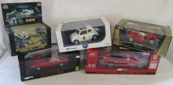 4 boxed die cast cars and a boxed remote control car inc MA RC 1:14 Ferrari,