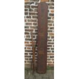Wooden church banner poles & a religious wooden plaque