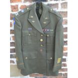 Reproduction US Army 8th Air Corps jacket with sleeve patches, lapel pins, shoulder badges,