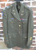 Reproduction US Army 8th Air Corps jacket with sleeve patches, lapel pins, shoulder badges,