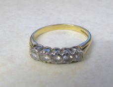18ct gold 5 stone diamond ring 0.