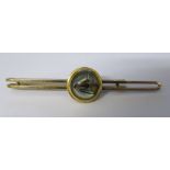 Gold plated reverse crystal intaglio tin clip depicting a horse