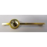 Yellow metal reverse crystal intaglio stock pin of a hare marked 750 total weight 8.