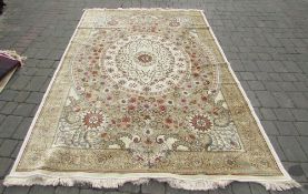 Ivory and gold ground Cashmere carpet with a unique floral medallion design 200 cm x 300 cm