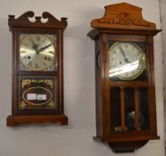 2 wall clocks