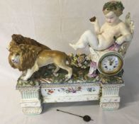 Large Meissen style 19th century figural clock depicting a putto in a chariot drawn by 2 lions