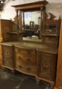 Late Victorian satin wood bow fronted sideboard with carved detail