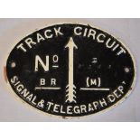 An oval cast metal railway signal and telegraph plaque "Track Circuit" BR (M)