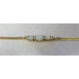 14ct gold opal and diamond bracelet weight 6.