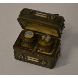 Leather & mother of pearl dual travelling inkwell shaped as a miniature treasure chest,