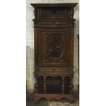 Large French ornate walnut cabinet with a carved Joan of Arc panel H182cm W77cm