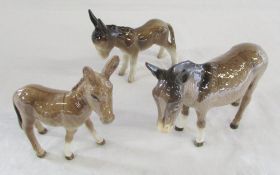 2 Beswick donkeys and one other