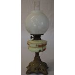 Oil lamp with a floral reservoir and white shade