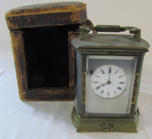 Brass carriage clock with silver face and original travelling case H 14 cm (not including handle)