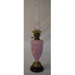 Oil lamp with a pink floral base
