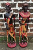 Pair of carved wooden African tribal figures H65cm