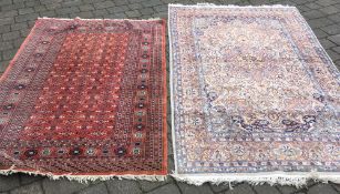 2 Persian style rugs with red & blue/ivory grounds.