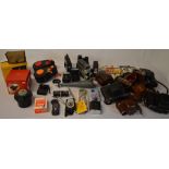 Quantity of photography accessories including flash units, camera cases,