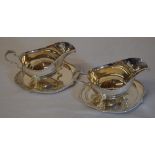 2 large silver sauce boats on three paw feet with lion head mounts London 1978 and 2 sauce boat