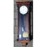 Vienna regulator wall clock in a mixed wood case with a pie crust bezel.