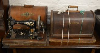 2 singer sewing machines (AF)