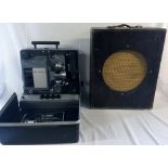 Bell & Howell film projector with cabinet speaker & film spool