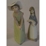 Lladro figures 'Curious Girl with Hat' and a young girl holding a piglet