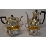 A silver tea & coffee set including teapot, coffee pot, sugar bowl and milk jug,