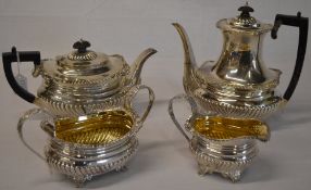 A silver tea & coffee set including teapot, coffee pot, sugar bowl and milk jug,