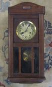 1930s oak cased wall clock