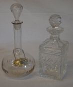 2 decanters and a silver Sherry bottle label