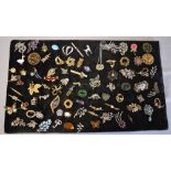 Large board of mixed costume jewellery brooches