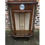 1930's bow fronted display cabinet with inset clock (not working)