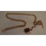 A heavy 9ct gold large link watch chain with T bar and bloodstone/carnelian swivel fob,