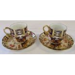 Pair of Imari coffee cups and saucers pattern no 2614 crown mark to underside
