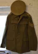 Military jacket and hat with Lincoln V epaulette patches,