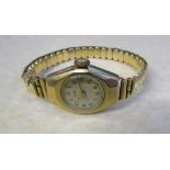 9ct gold ladies 'LIP' watch with rolled gold elasticated strap (weight of back plate 2.