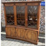 Regency style concave display bookcase in mahogany,
