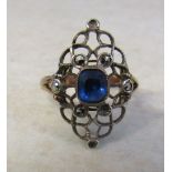 9ct rose gold ring with blue central stone & marcasite style stones (some missing) size K weight 2.