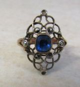 9ct rose gold ring with blue central stone & marcasite style stones (some missing) size K weight 2.