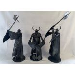 Group of 3 large steel helmeted warriors by sculptor Ron Lyon.