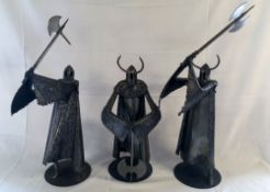 Group of 3 large steel helmeted warriors by sculptor Ron Lyon.