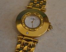 Ladies 18ct gold Jaeger le Coultre wristwatch with mother of pearl dial within a beaded bezel set