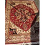 Red ground Heriz carpet 2.30m by 1.