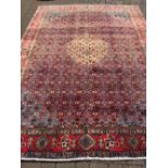 Large red & blue ground Persian carpet with traditional senadash design 310cm by 210cm