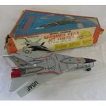 Battery operated Grumman FIIIA jet fighter toy